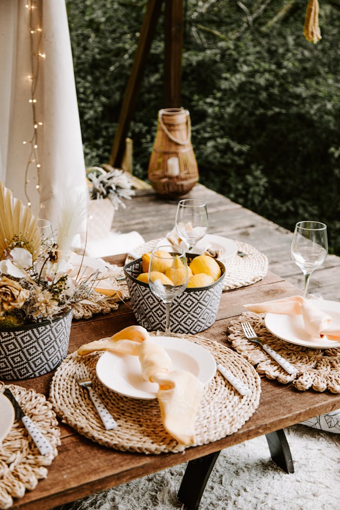 programs-02 Elegant outdoor table setting with lemons and floral decor in Sigulda, Latvia.